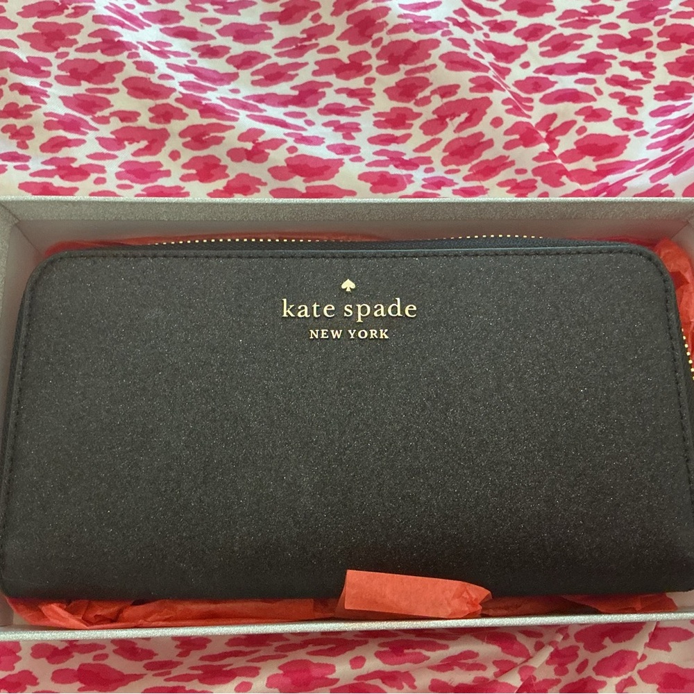Kate Spade Black wallet with a little sparkling within. 
Brand new
